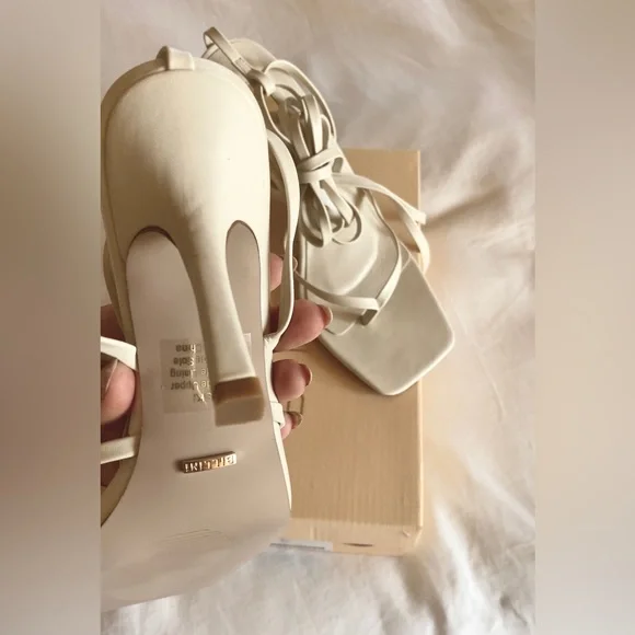 Saski by Billini is a modern, strappy heel. In the SOLD OUT color bone. - Picture 5 of 5